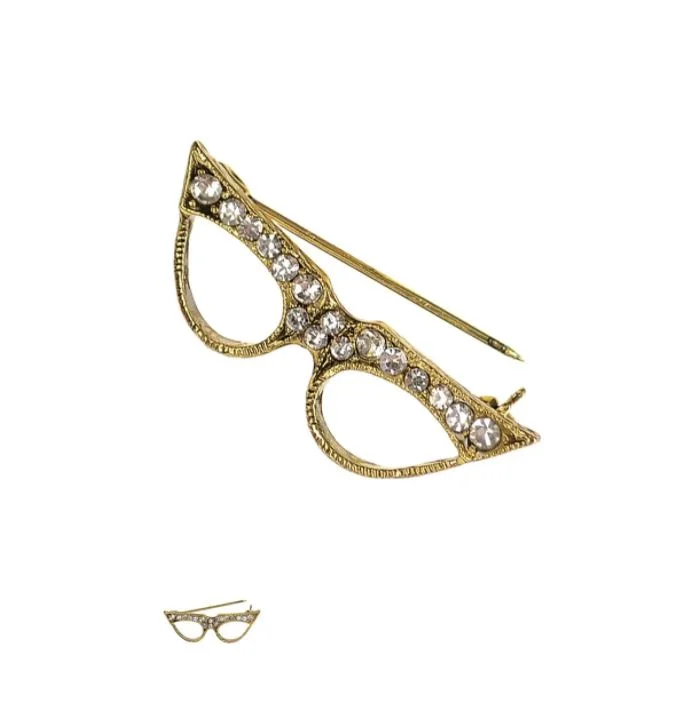 Classic Brooch with Detailed Gemstones-Hot Tomato Spectacular Specs Brooch in Antique Gold and Clear Crystals